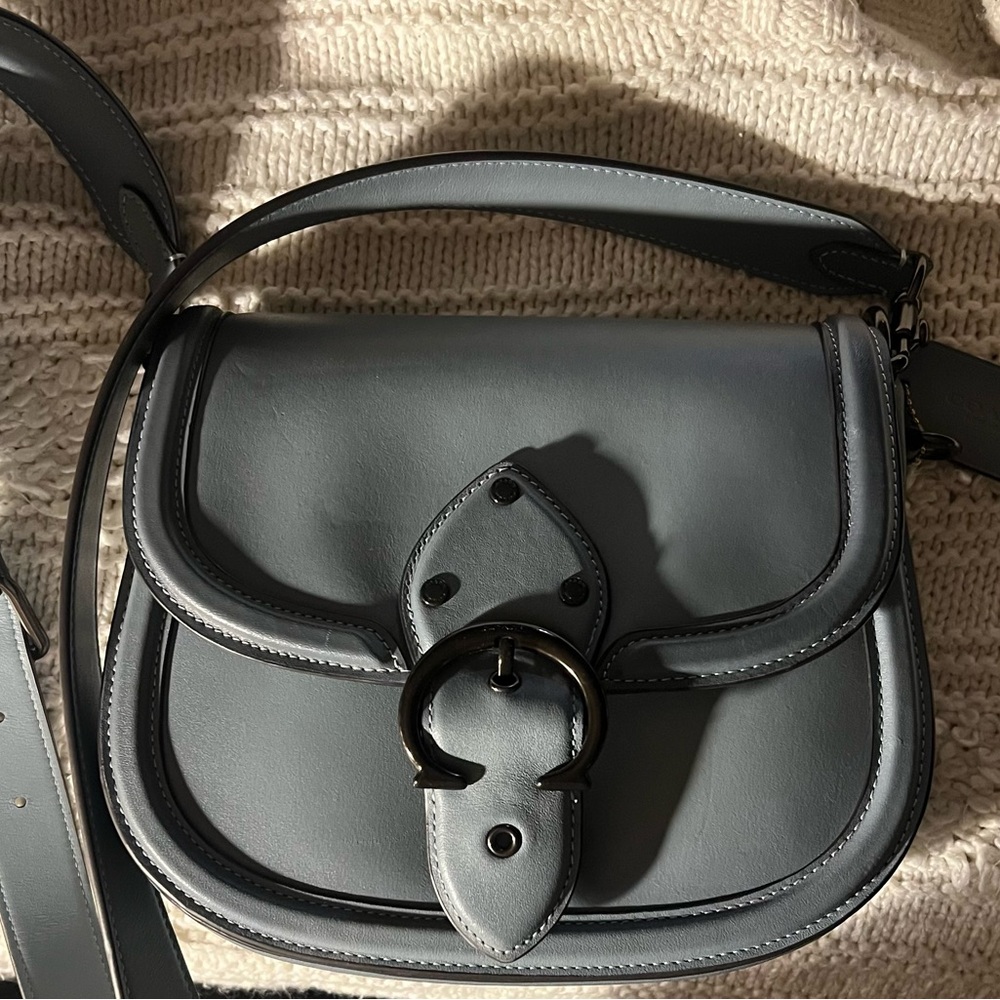 Coach Beat crossbody saddle bag. Color is teal